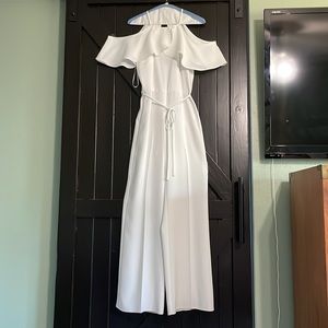Like New River Island white, off the shoulder jumpsuit.